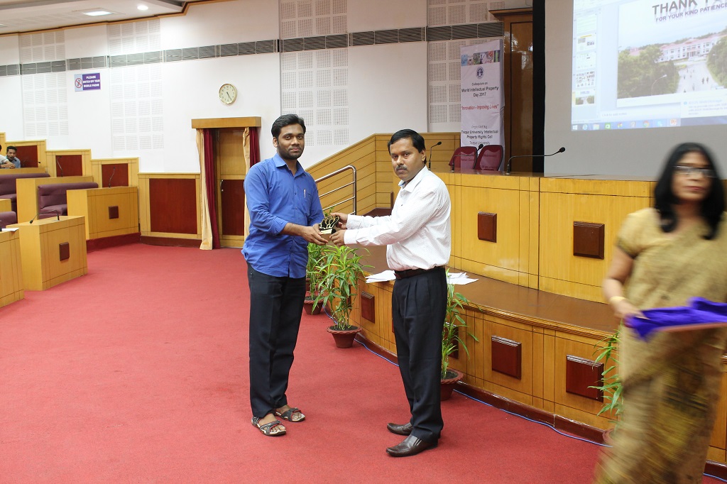Winner receiving prize for the Best Innoative Idea Competition